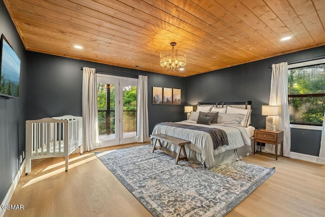 4822 White Pine Way, Sevierville, TN 37876 - bedroom with wooden ceiling, a chandelier, wood finished floors, recessed lighting, and access to exterior