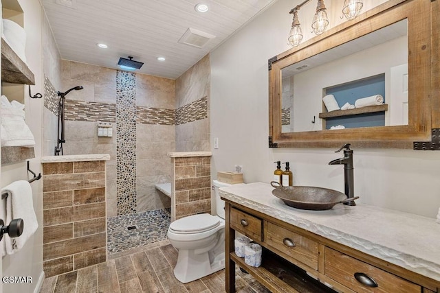 4822 White Pine Way, Sevierville, TN 37876 - full bathroom with vanity, a walk in shower, wood finished floors, and recessed lighting