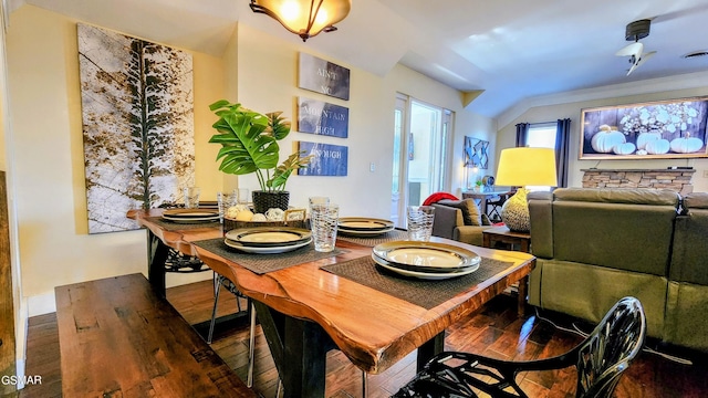 dining space with hardwood / wood-style flooring