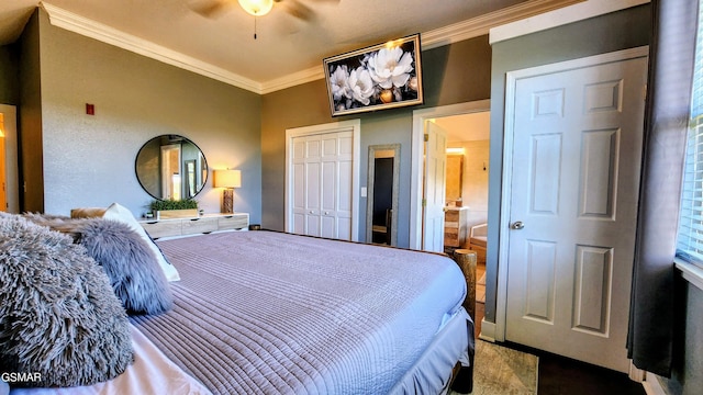 bedroom featuring crown molding, a closet, and ceiling fan