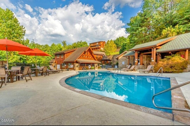 view of pool with a patio