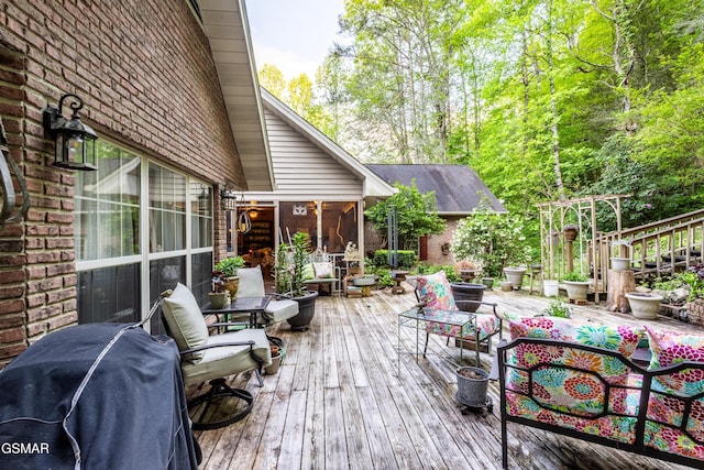 3012 Roaring Creek Way, Sevierville, TN 37862 - wooden deck featuring grilling area and a sunroom
