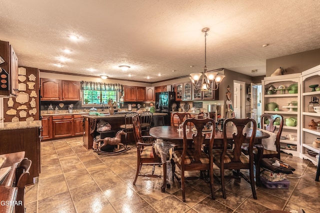 3012 Roaring Creek Way, Sevierville, TN 37862 - dining room with a textured ceiling and a chandelier