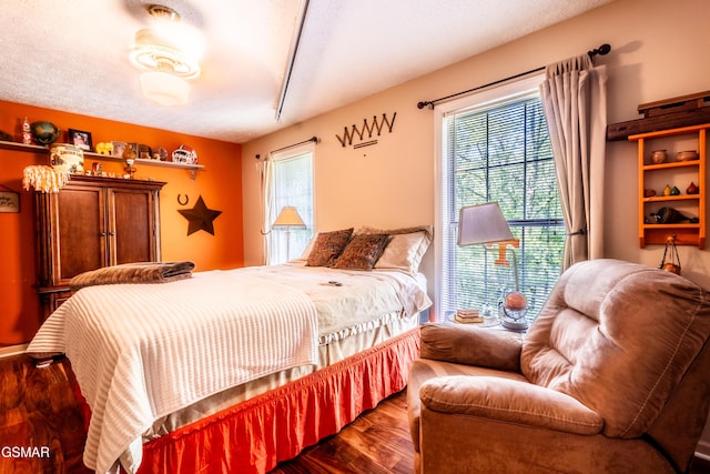 3012 Roaring Creek Way, Sevierville, TN 37862 - bedroom featuring wood finished floors and multiple windows