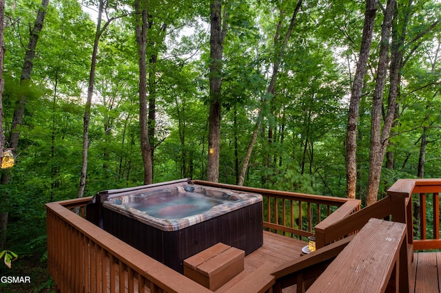 deck with a hot tub