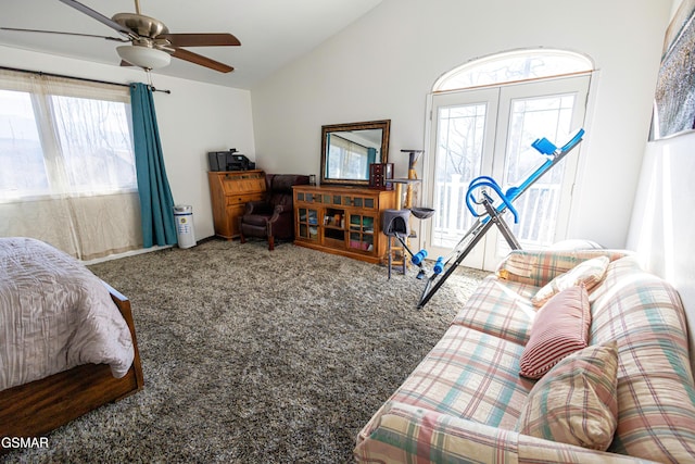 bedroom featuring ceiling fan, carpet, lofted ceiling, and multiple windows