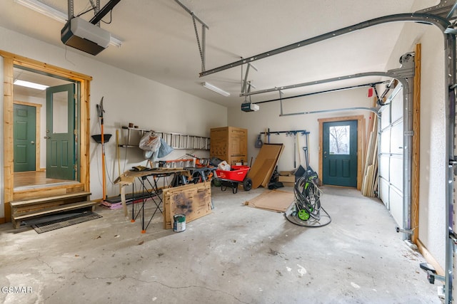 garage featuring a garage door opener