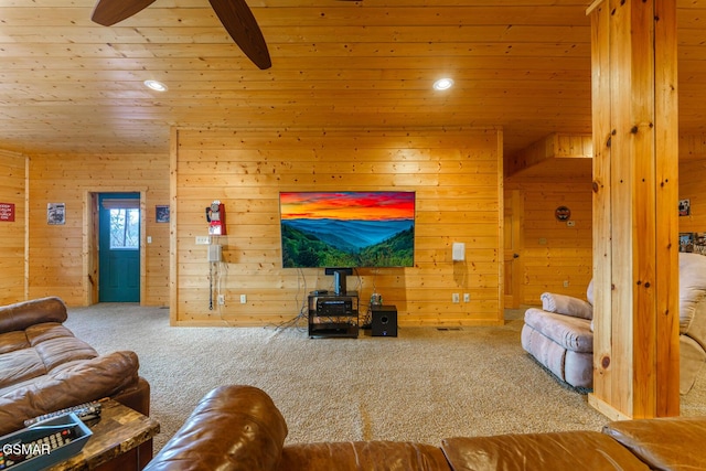 carpeted living room with wooden ceiling, ceiling fan, wood walls, beam ceiling, and recessed lighting