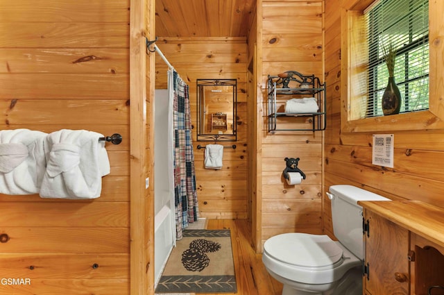 full bath with wooden walls, toilet, wood finished floors, wood ceiling, and shower / bath combo