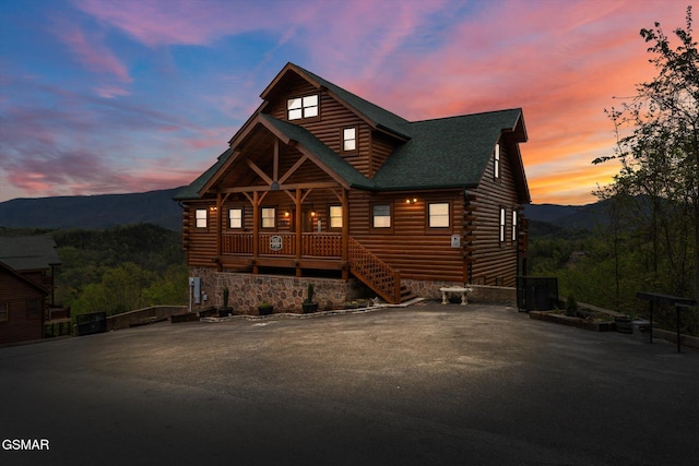 log home featuring a mountain view