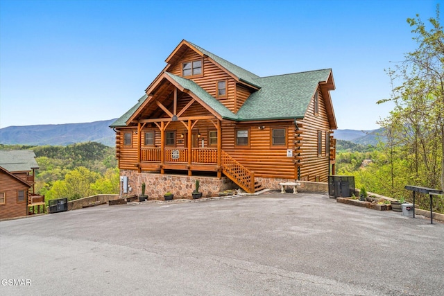 wooden terrace with a mountain view