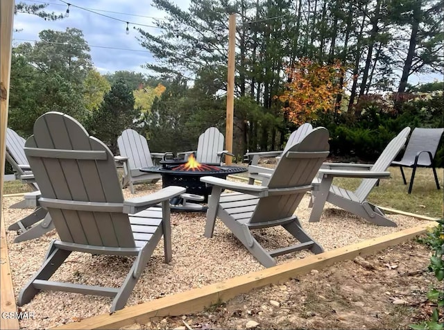 view of patio featuring an outdoor fire pit