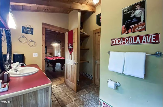 bathroom with a sink, tile patterned floors, pool table, and wood ceiling