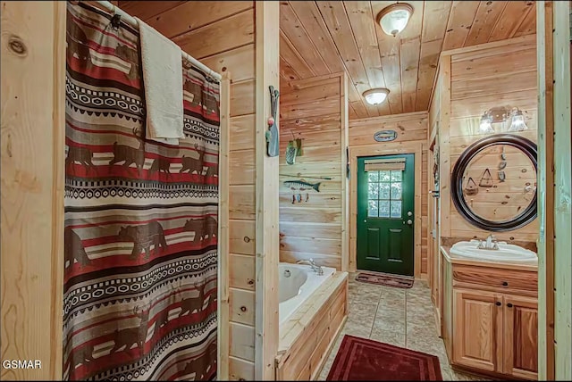 bathroom with wood ceiling, wooden walls, a garden tub, vanity, and tile patterned flooring