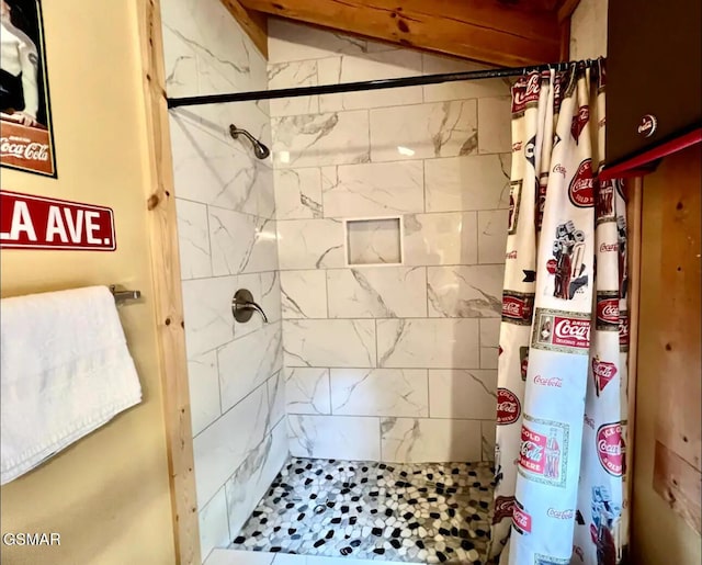 bathroom featuring a stall shower