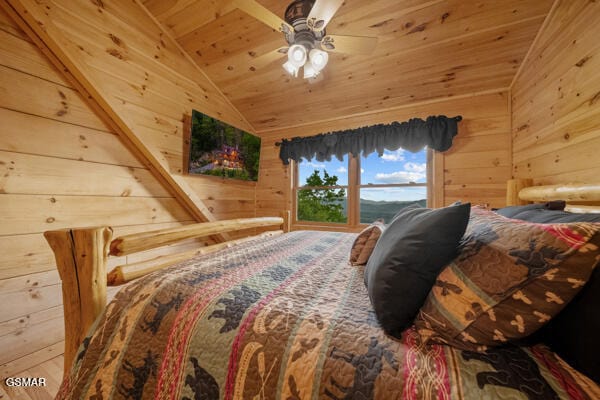 bedroom featuring wooden ceiling, wood walls, and lofted ceiling