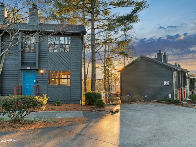 view of property exterior at dusk