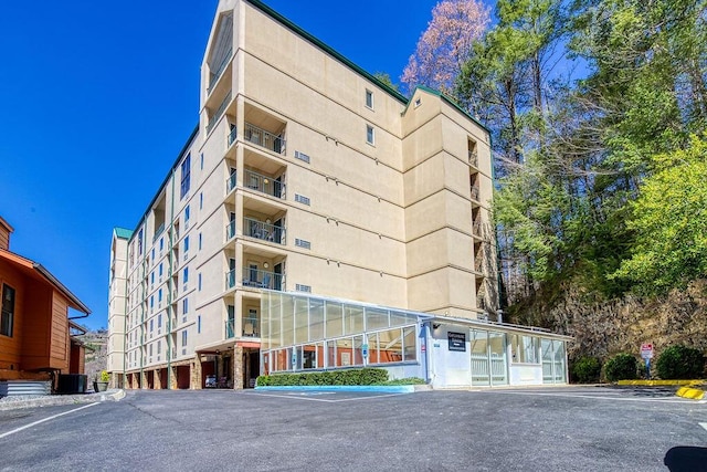 view of building exterior featuring central AC