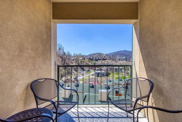 balcony featuring a mountain view