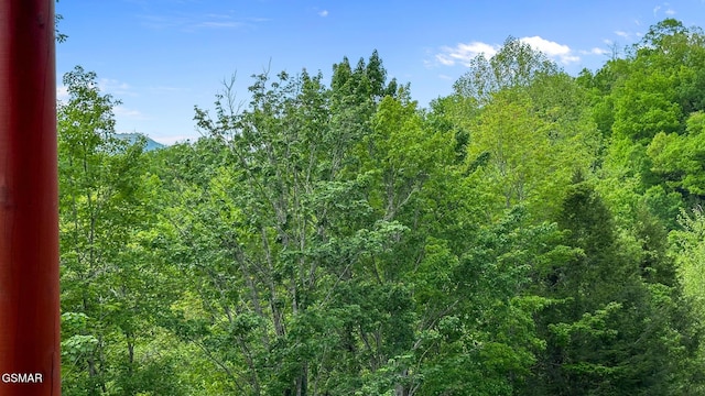 view of landscape with a view of trees