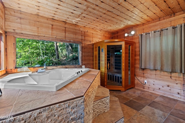 bathroom featuring wooden ceiling and wood walls