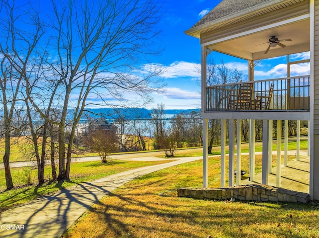 exterior space featuring ceiling fan and covered porch