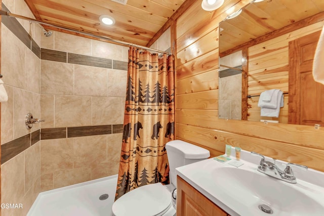 bathroom featuring wood walls, a shower stall, wooden ceiling, and vanity