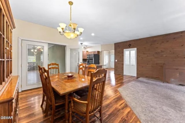 3351 Line Springs Rd, Sevierville, TN 37862 - dining room featuring a chandelier and dark wood-style floors