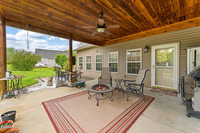 3351 Line Springs Rd, Sevierville, TN 37862 - view of patio with outdoor dining space, an outdoor fire pit, and a ceiling fan