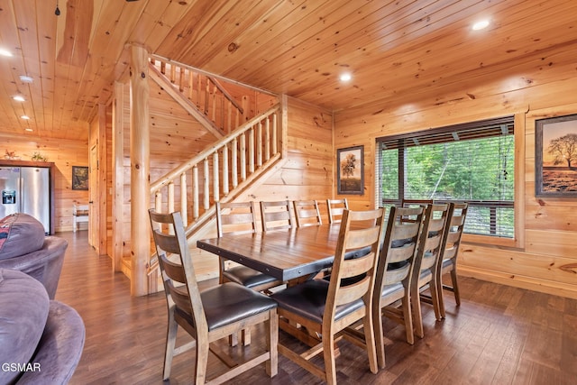 3181 Thomas Headrick Rd, Sevierville, TN 37862 - dining space featuring wooden walls, recessed lighting, wood ceiling, hardwood / wood-style floors, and stairway