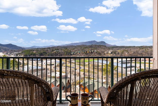 balcony featuring a mountain view