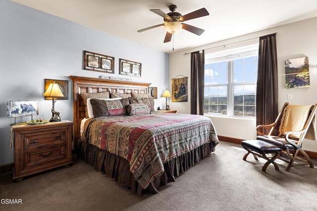 bedroom featuring baseboards, carpet, and ceiling fan