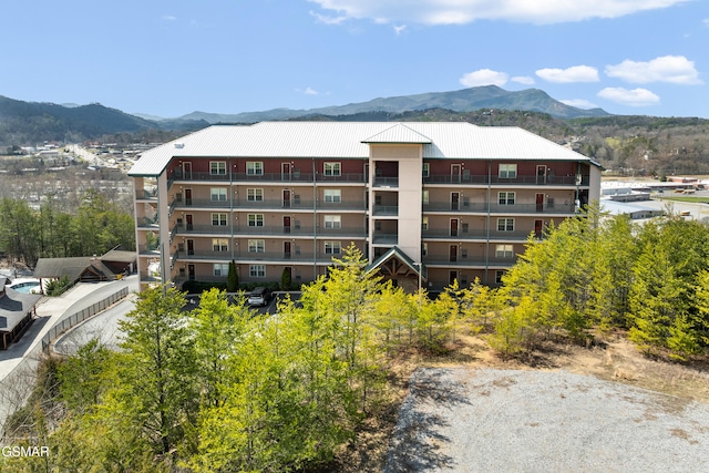 view of building exterior featuring a mountain view