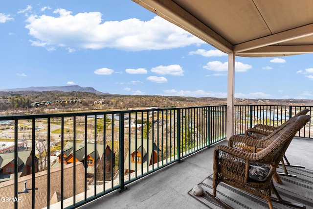 balcony featuring a mountain view