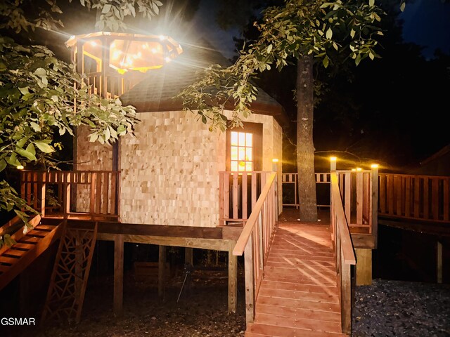 view of deck at night