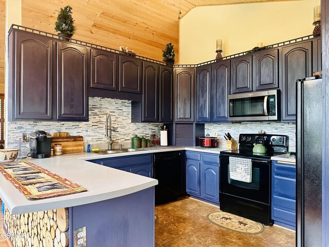 kitchen featuring wood ceiling, dark brown cabinets, sink, black appliances, and lofted ceiling