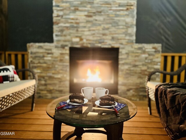 wooden deck featuring a fireplace