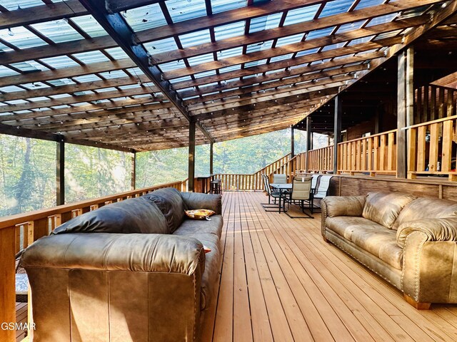 wooden deck featuring outdoor lounge area