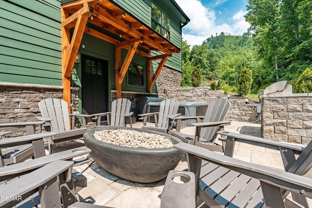 706 Kelly St, Gatlinburg, TN 37738 - view of patio with an outdoor fire pit and an outdoor bar