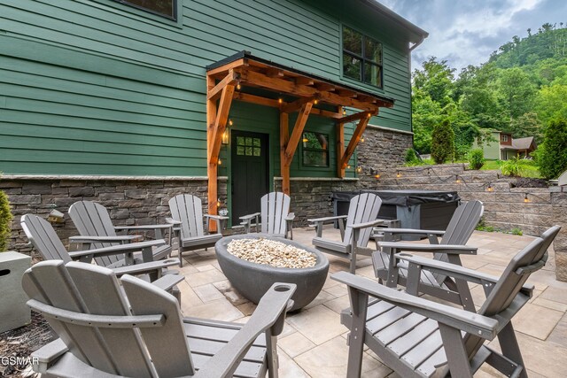 706 Kelly St, Gatlinburg, TN 37738 - view of patio with a hot tub
