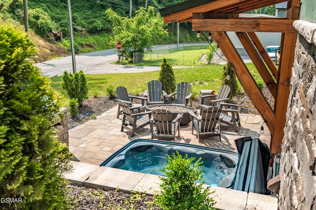 706 Kelly St, Gatlinburg, TN 37738 - view of pool with a patio, a hot tub, and an outdoor fire pit