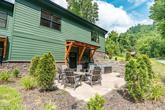 706 Kelly St, Gatlinburg, TN 37738 - view of patio / terrace with a fire pit
