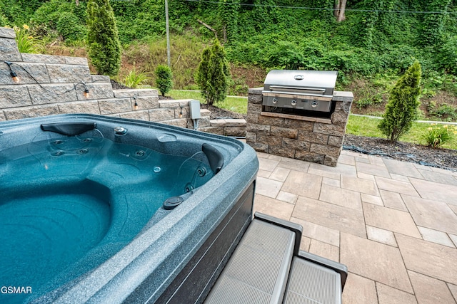 706 Kelly St, Gatlinburg, TN 37738 - view of patio featuring a grill and a hot tub
