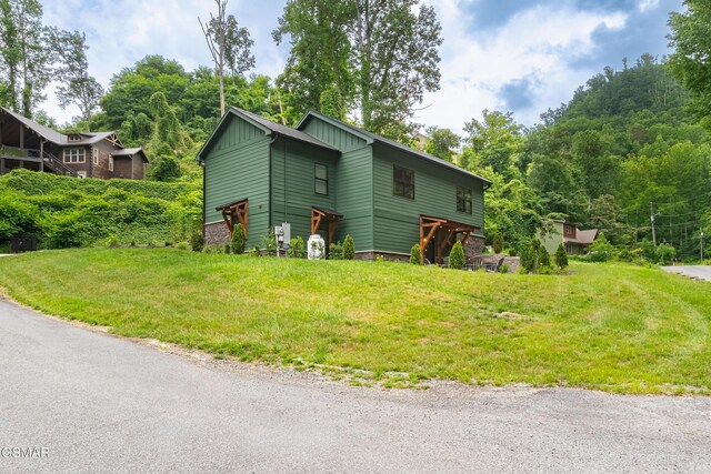 706 Kelly St, Gatlinburg, TN 37738 - view of side of home with board and batten siding