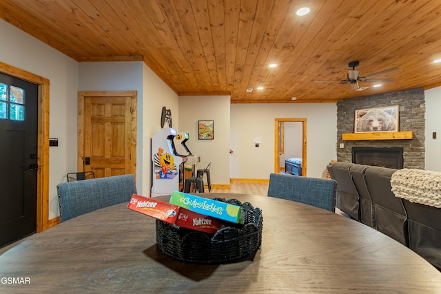 706 Kelly St, Gatlinburg, TN 37738 - dining space featuring wooden ceiling, a stone fireplace, recessed lighting, a ceiling fan, and wood finished floors