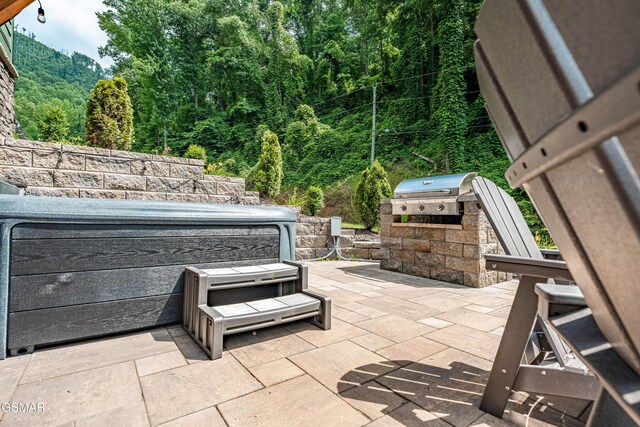 706 Kelly St, Gatlinburg, TN 37738 - view of patio / terrace featuring a grill and a forest view
