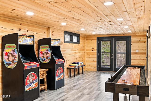 playroom with wood walls, french doors, recessed lighting, wood finished floors, and wood ceiling