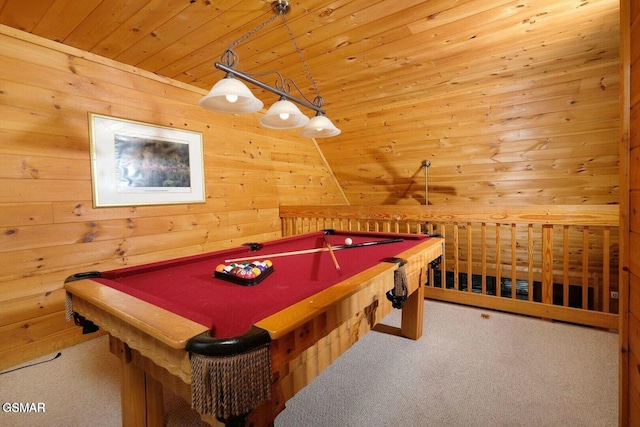 rec room with carpet flooring, wood walls, wooden ceiling, and pool table