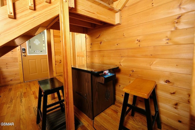 448 Silver Maple Ln, Gatlinburg, TN 37738 - bar area featuring wood walls, wood finished floors, and lofted ceiling