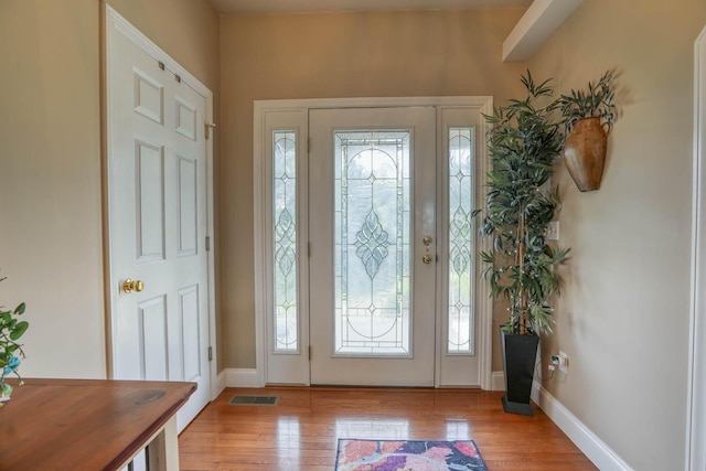 foyer entrance featuring light wood-type flooring